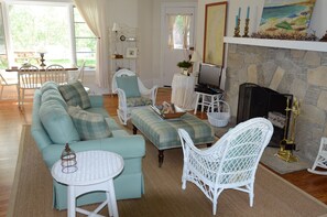 The large living room, with views of the harbor