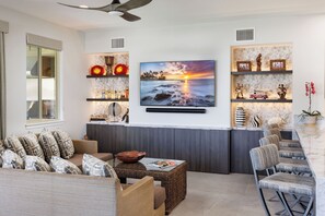 65" flat screen and Sonos surround sound in the Living Room
