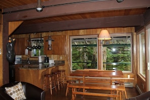 Dining Area is bright & cheery with views