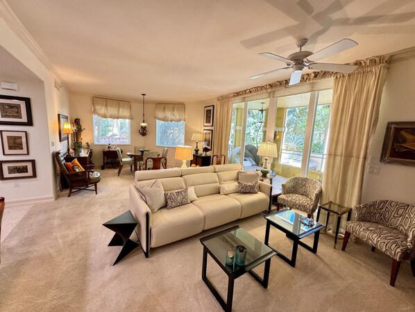 Living room. dining room, with adjustable built in lounge chairs in sofa.