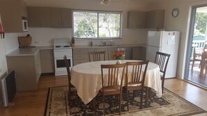 Fully equipped kitchen and inside expandable dining table.