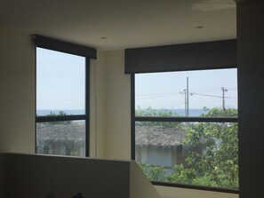 Stairs going to bedroom and the view from kitchen/ living room