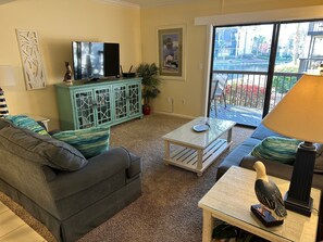 Living room with Smart HDTV, supports Netflix, YouTube and Prime video