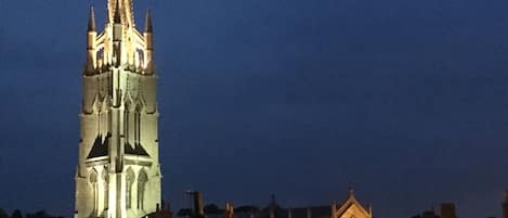 View of the church at night from Rooftops 