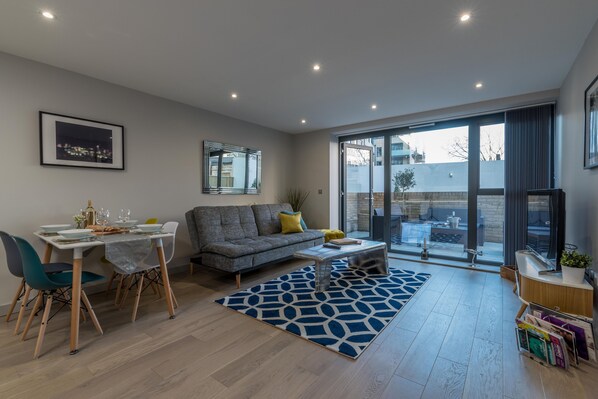 Kitchen and lounge with outdoor space is perfect for everyone's stay in London.