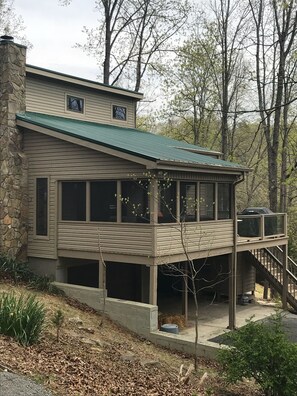 Screened in porch facing lake