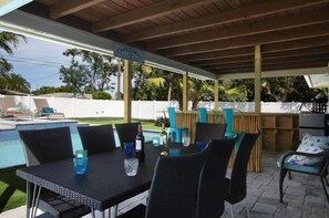 Poolside lanai with tiki bar
