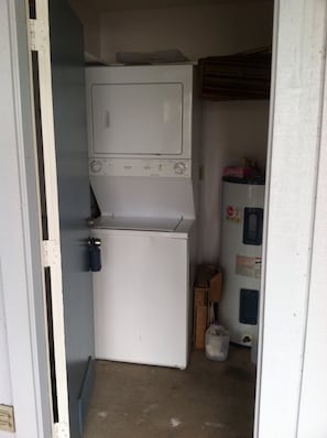 Laundry room underneath unit.