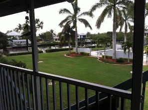 Lanai looking out to pool, canal and docks.
