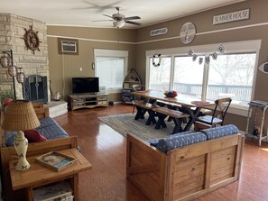 Gather and eat in this living room just off the kitchen. 
