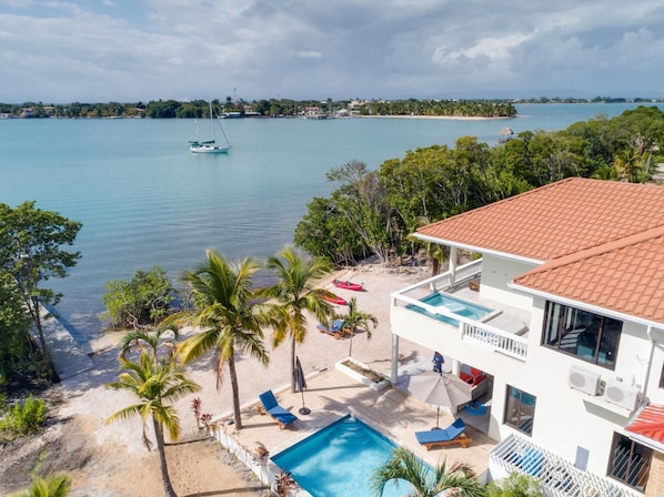 Property wide shot - Placencia Point across the water.