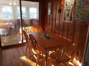 Eat-in Kitchen (seats 6)  with sliders to the three season room