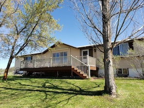 Front of house with deck.