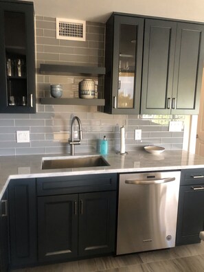 Kitchen is complete with everything needed to make this your home away from home