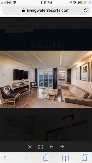 Spacious living area, with fireplace and walk-out to Balcony