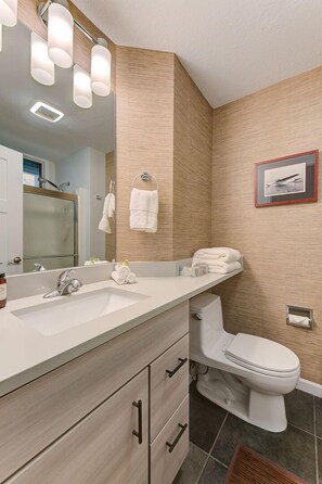 The bathroom is equipped with a hot and cold shower for your comfort and preference.