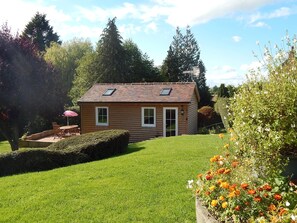 View of cabin from top lawn.