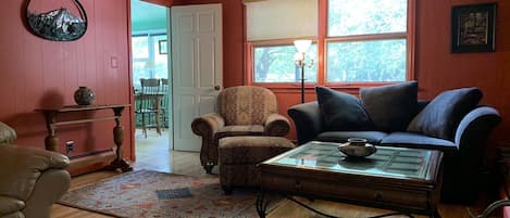 Living room , looking into sunroom/ dining room