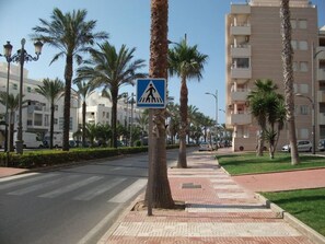 View of th building, street and beach