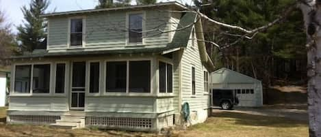 Front of Hill Top Bungalow-shows screen (sleep) porch, depth & detached garage