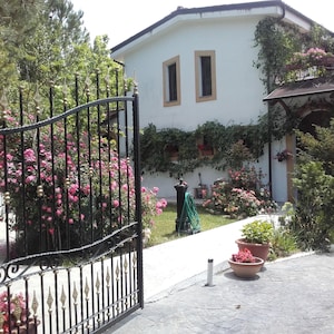 Casa con giardino in villa 