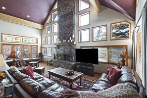 Large, Cathedral Ceiling and Windows Frame the Mountain Landscape of Deer Valley