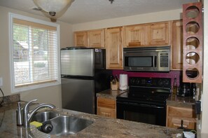 Fully stocked kitchen. Full sized frig, diswasher,  brand new full sized stove.