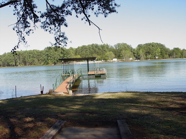 Serenity!! Path to private dock, water, lights and electric at waters edge