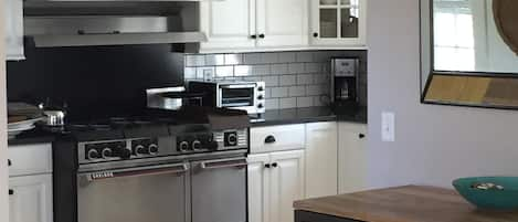 Newly renovated kitchen and breakfast bar.  