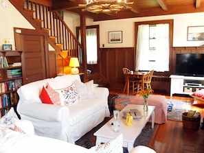 Living room with game table and flat screen TV