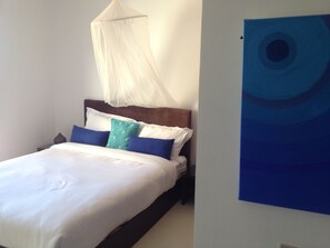 bedroom  2 wardrobes, hair dryer doors to balcony &  bathroom and kitchen