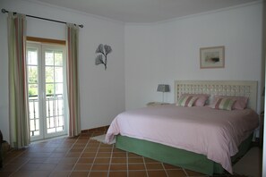 Master bedroom + balcony overlooking 9th Fairway