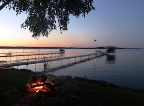 Picture yourself sitting around the bonfire enjoying this amazing lake view!