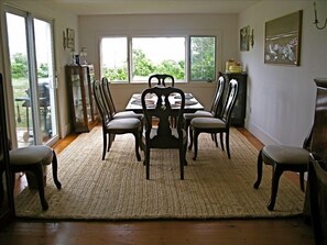 Dining Room with Ocean view and door to deck with grill