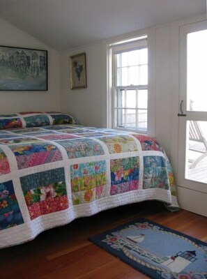 Queen Bedroom with private deck and ocean views