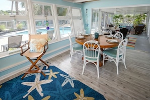 Dining table and lanai with plenty of room for your family and guests 