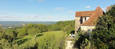 View of the house from the sheep lane to the West with the Dordogne River below