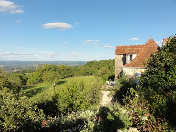 View of the house from the sheep lane to the West with the Dordogne River below