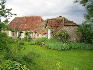 View from the road of the Bake House with Main House behind
