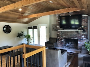 Upstairs living area to covered porch