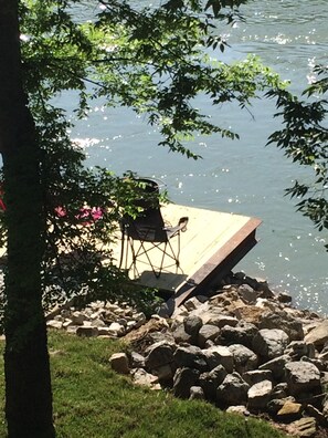 deck in front yard hanging over beautiful current river