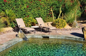 Loungers at poolside.