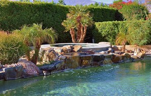 Spa, waterfall, pool.