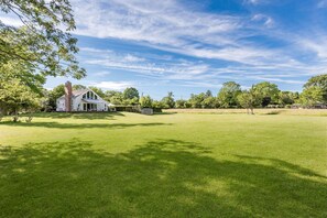 View of the property from the fire pit area.