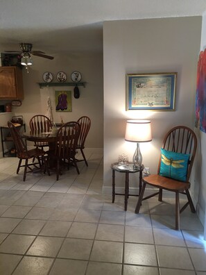 Dining area off kitchen and living area with patio door to Bayou