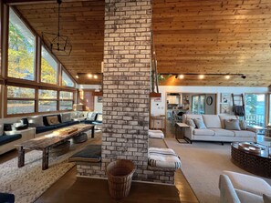 Seating for the whole gang in this 'GREAT' room that features double fireplace