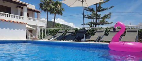 View from the pool towards the villa.