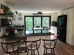 Dining table in kitchen, or eat at the granite counter