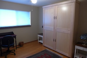 BR 2 with bed folded for work space.