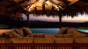 Sunset at the pool's palapa